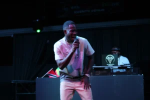 Learn how to master challenging low-light, high-contrast event photography. Real-world case study for junior and aspiring photographers.