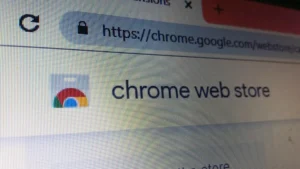 Close-up of a computer screen showing the Chrome Web Store logo and header text in a browser window.